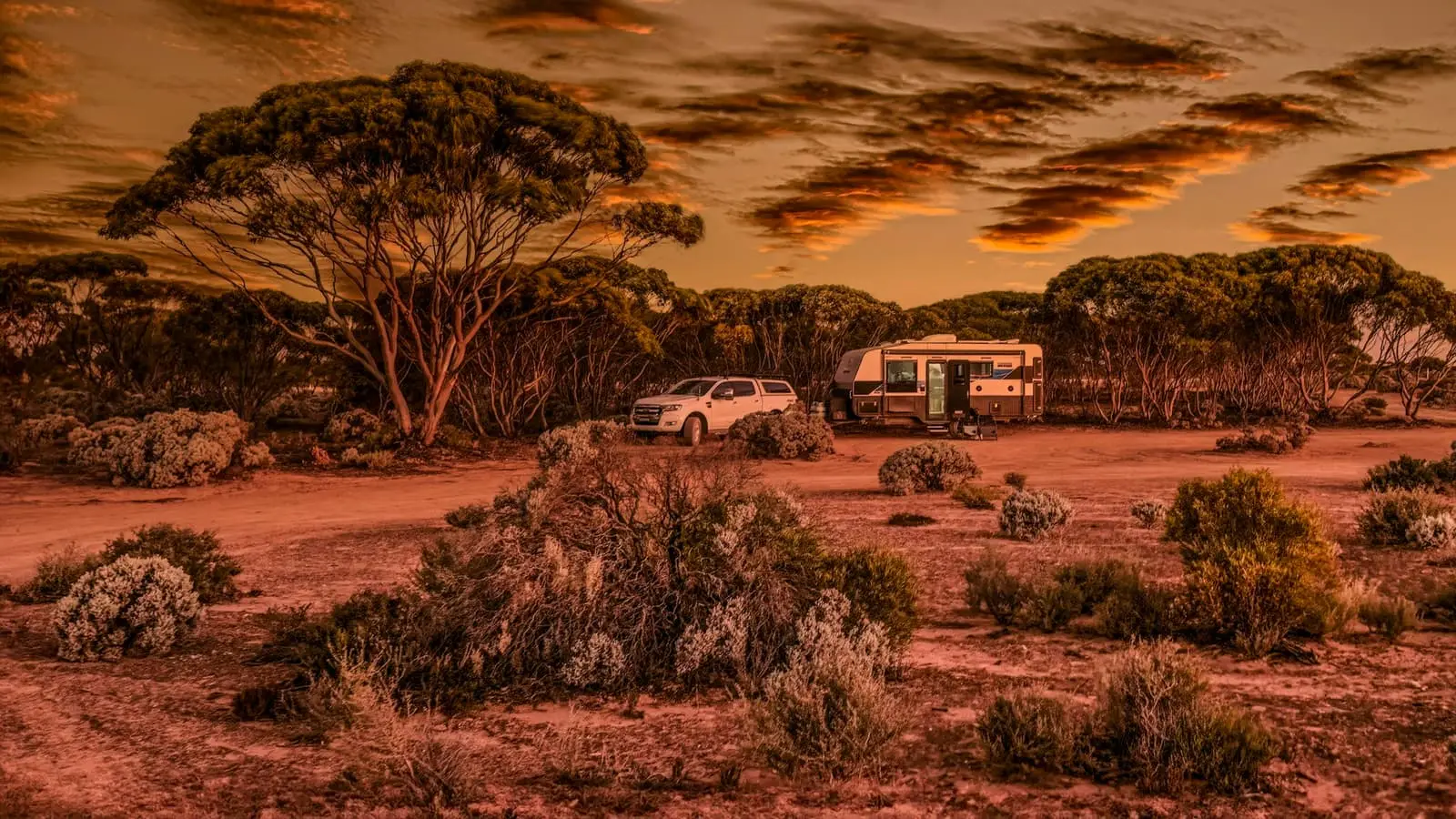 Four wheel drive vehicle parked on sand at Fowlers Bay coast, South Australia (closest match, no caravan visible)