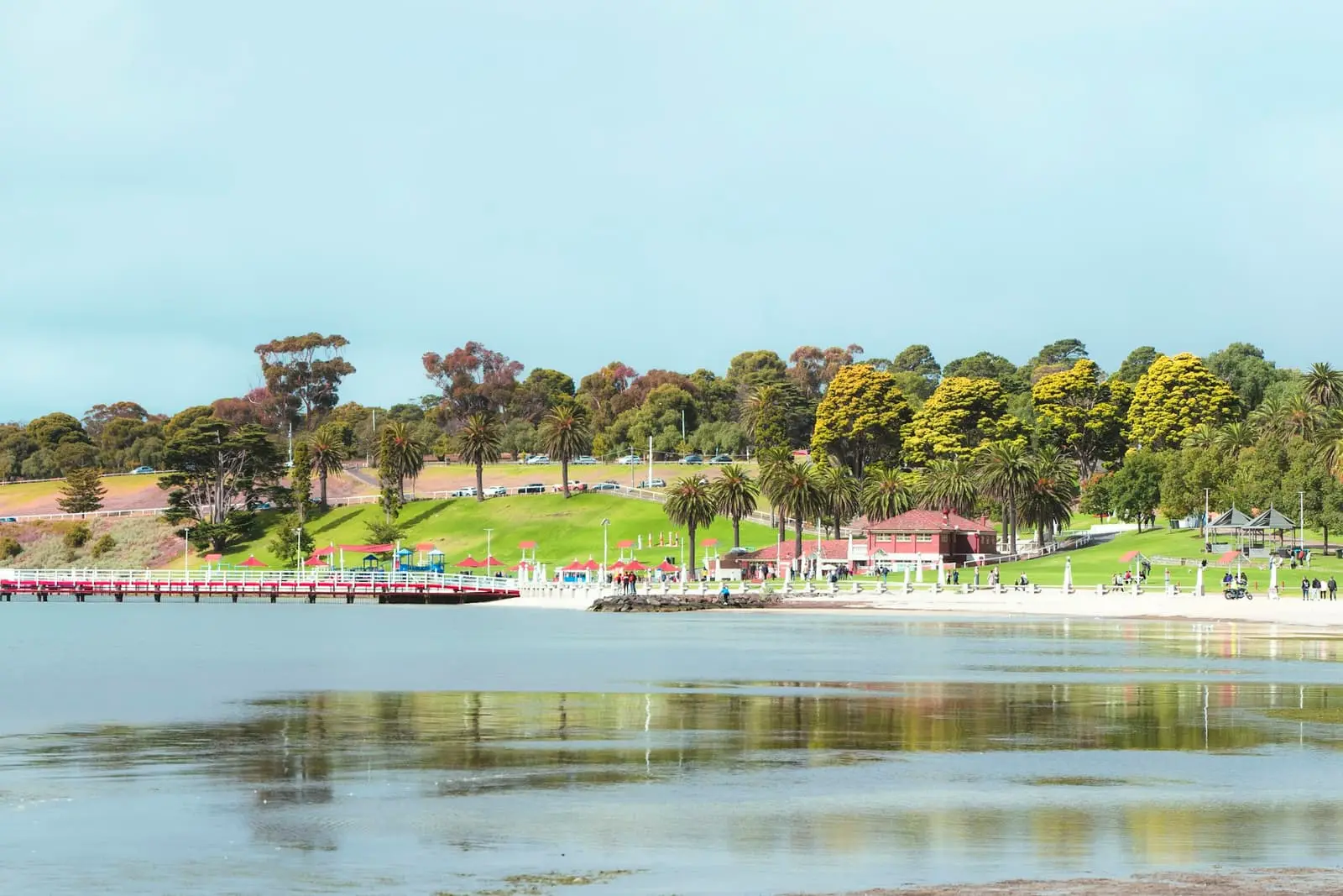 Geelong waterfront with bay water, trees and a bridge