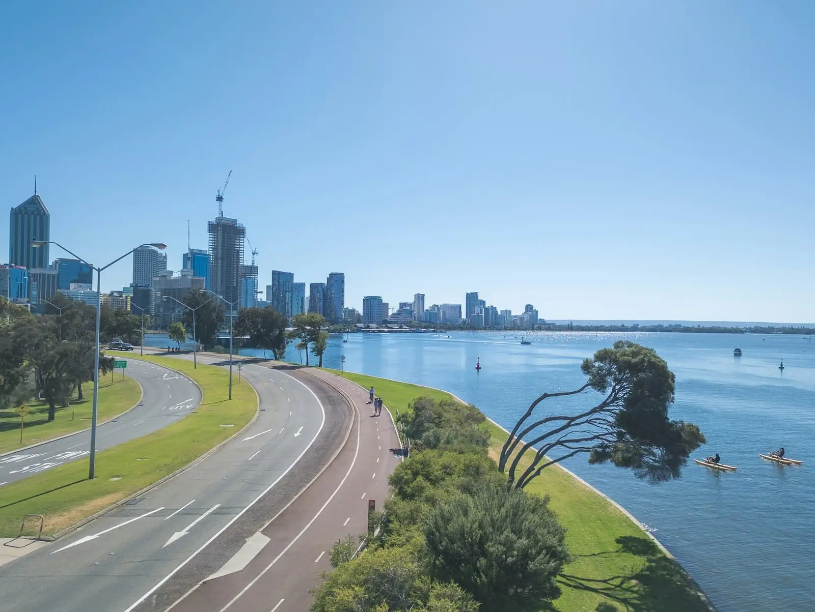 Perth city skyline viewed across the Swan River water